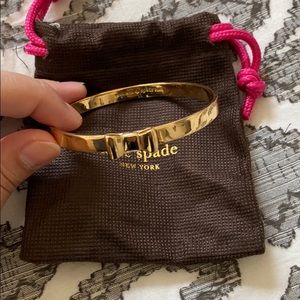 Kate Spade Take a Bow gold bangle bracelet